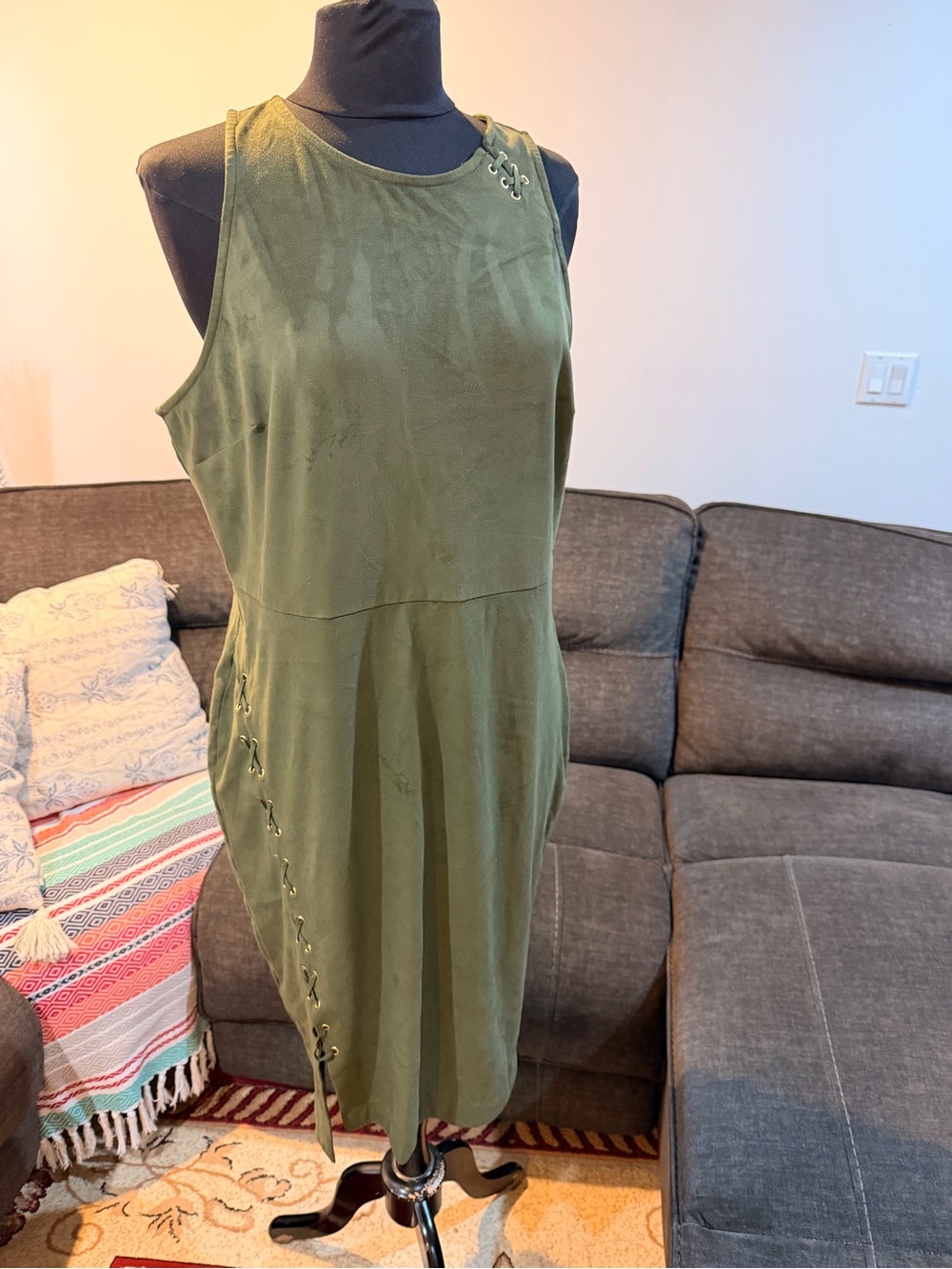 Jennifer Lopez velvet feels green dress with cross lace design on the side